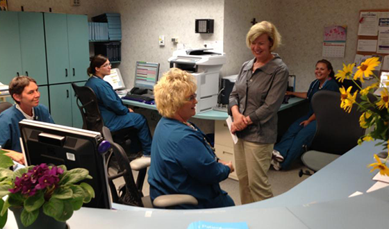 Senator Baldwin with nurses at hospital